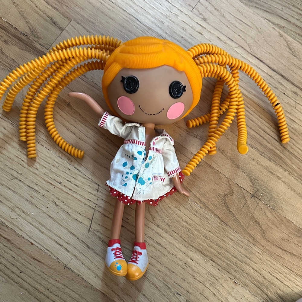 Whimsical Orange-Haired Doll with White Outfit